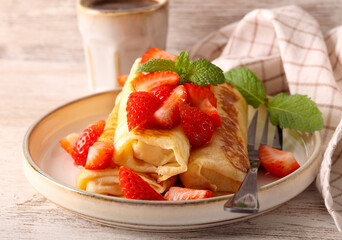 Crepe rolls with strawberry