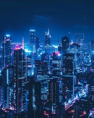 Obraz premium Futuristic Smart City Skyline Illuminated by Renewable Energy Efficient Lights at Night Symbolizing Sustainability and Innovation