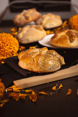 Pan de Muerto. Typical Mexican sweet bread that is consumed in the season of the day of the dead. It is a main element in the altars and offerings in the festivity of the day of the dead.