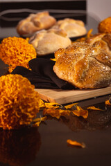 Pan de Muerto. Typical Mexican sweet bread that is consumed in the season of the day of the dead. It is a main element in the altars and offerings in the festivity of the day of the dead.