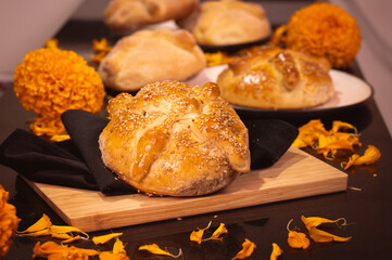 Pan de Muerto. Typical Mexican sweet bread that is consumed in the season of the day of the dead. It is a main element in the altars and offerings in the festivity of the day of the dead.