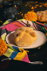 Pan de Muerto. Typical Mexican sweet bread that is consumed in the season of the day of the dead. It is a main element in the altars and offerings in the festivity of the day of the dead.