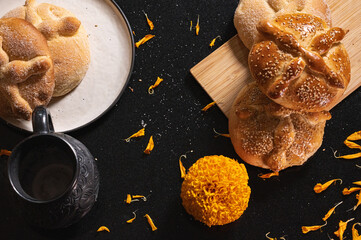Pan de Muerto. Typical Mexican sweet bread that is consumed in the season of the day of the dead. It is a main element in the altars and offerings in the festivity of the day of the dead.