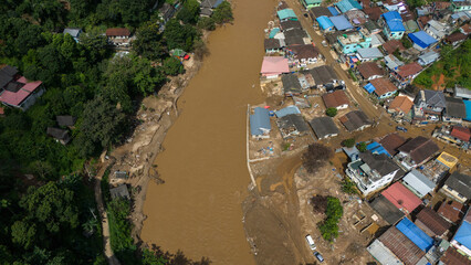 Aerial view of Sai river a river that forms the natural border between Thailand and Myanmar at Tachileik and Mae Sai districts. © boyloso