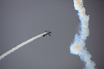 Seoul Air Show, Seoul Airport, Seongnam, Gyeonggi-do, Korea - October 18, 2019: A biplanes smoke and perform aerobatics.
