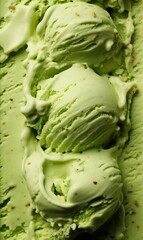 Obraz premium Green ice cream with pistachios. Closeup ice cream background