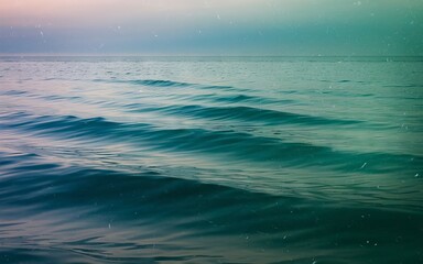 Obraz premium Calm ocean waves. Serene ocean surface with gentle waves, symbolizing peace and tranquility.