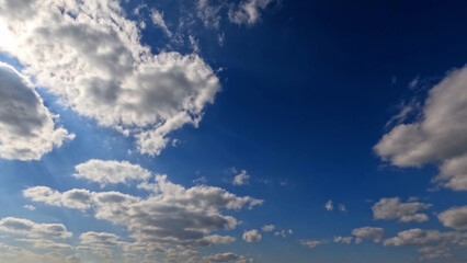 pretty huge clouds in the blue sky background - photo of nature