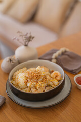 Appetizing Thai Stir-Fried Rice Noodles with Seafood (Kuay Tiew Kua Talay) - Delicious Traditional Dish with Shrimp, fish and squid.