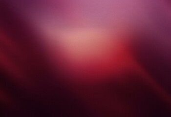 Abstract grainy burgundy background with a gradient of light to dark.