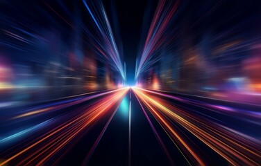 Abstract image of a highway with bright colored streaks of light converging in the distance