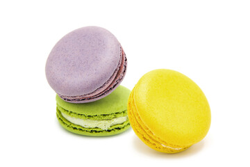 Sweet colorful varied assortment macarons cookies with filling isolated on a white background. Handmade traditional sweets. Clipping Path.