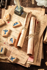 Original runic divination based on antique scrolls as mystical background