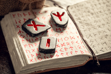 Rune stones omen based on futhark alphabet as mystical background