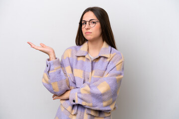 Young girl isolated on white background having doubts