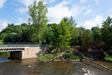 A concrete bridge over a little river