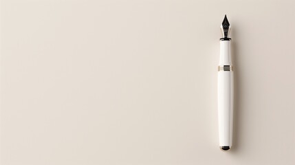 Elegant white fountain pen on minimalist beige background for creativity and writing concepts