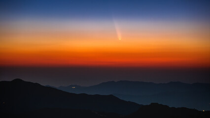 Comet C/2023 A3 Tsuchinshan ATLAS is traveling through space. The comet appears in the early...