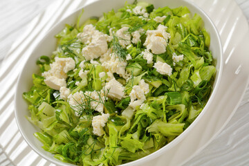 Classic Greek green lettuce salad with feta cheese