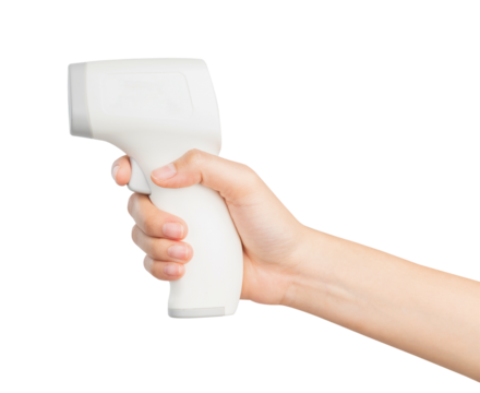 Hand holding thermometer gun, temperature measurement device isolated on white background.