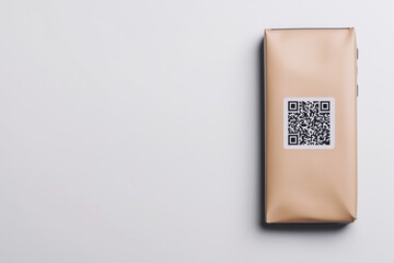 Mobile device with QR code on a simplistic white background.