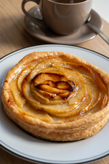 French fresh baked sweet puff pastry with fresh apple fruits in sirup  in confectionery shop