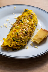 French omelette with seasonal green asparagus vegetables, tasty food for healthy vegetarian lunch