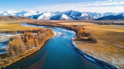 Fototapeta premium Serene River Landscape in Majestic Mountain Range