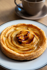 French fresh baked sweet puff pastry with fresh apple fruits in sirup  in confectionery shop
