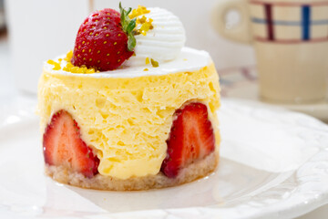 Red fruit sweet dessert cheesecake tart with fresh strawberries in bakery