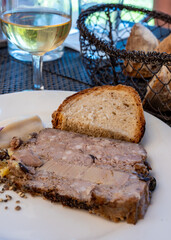 Terrine foie gras fat liver specialty food product made of liver of a duck or goose fattened by force feeding, served in French restaurant in Perigoed, Dordogne, close up