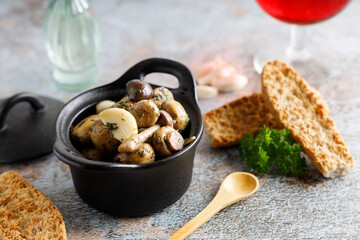 Mushrooms in garlic butter sauce.