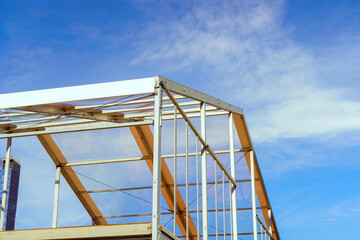 During construction, steel beam structures frame building office