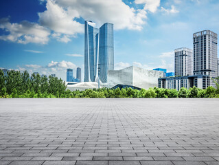 Fototapeta premium Stunning Urban Cityscape Featuring Modern Architecture Against a Blue Sky