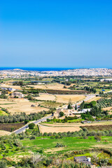 MDINA CITY, MALTA - AUGUST 05, 2021. The Silent City. This was once the Capital City of Malta. The houses are built of sandstone which is traditional for Malta. During summer on a hot sunny morning.