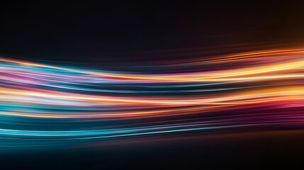 abstract background consisting of moving shining bright and neon lines, similar to traces of car headlights