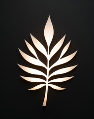 Obraz premium An elegant leaf silhouette illuminated on plain black background