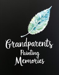 Grandparents painting memories with a leaf on plain black background