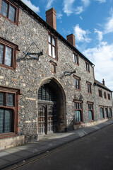 Old building stone house on street large wooden doors architecture