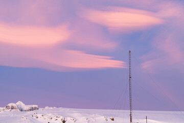 Cloudscape with rare Nacreous clouds at sunset in Antarctica. Sky with mother of pearl clouds
