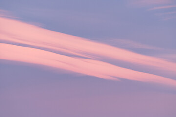 Cloudscape with rare Nacreous clouds at sunset in Antarctica. Sky with mother of pearl clouds