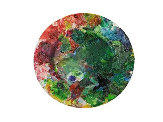 palette with paint. Ceramic plate, multi-colored mixing plate. Used, paint smeared all over the plate.