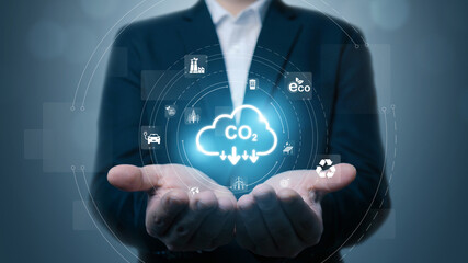 Hand of human holding Co2 icon for ESG,  net zero. World sustainable environment concept. Save our Planet, World Environment Day, World Earth Day and Climate change.