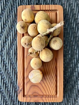 Dokong, duku or langsat fruits in southeast asia. Sweet fruit with translucent flesh. Lanzones fruit or scientific name Lansium Domesticum.