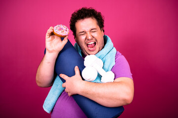 Diet and healthy lifestyle. Funny fat man and sweet donuts.
