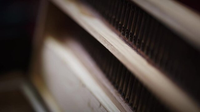 The internal mechanism of the harmonium, a famous Indian classical instrument, Closeup Shot, inside of harmonium