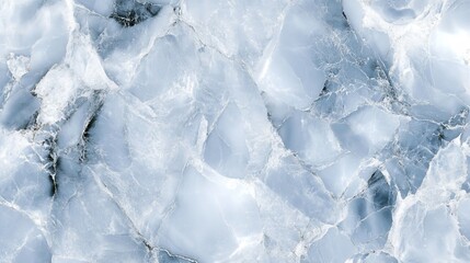 A textured surface resembling ice or crystal, showcasing shades of blue and white.