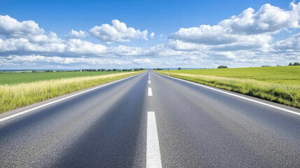 Endless Highway Through Lush Green Fields Under a Blue Sky