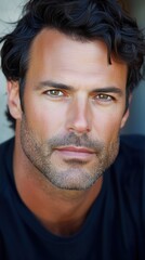 Obraz premium Capturing a confident Caucasian man with striking features in soft natural light