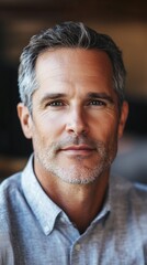 Obraz premium Caucasian man, around 45 years old, reflects thoughtfully in a natural setting